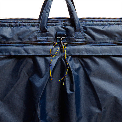 Blue MIC Nomad Travel Bag with Yellow Striped Zippers